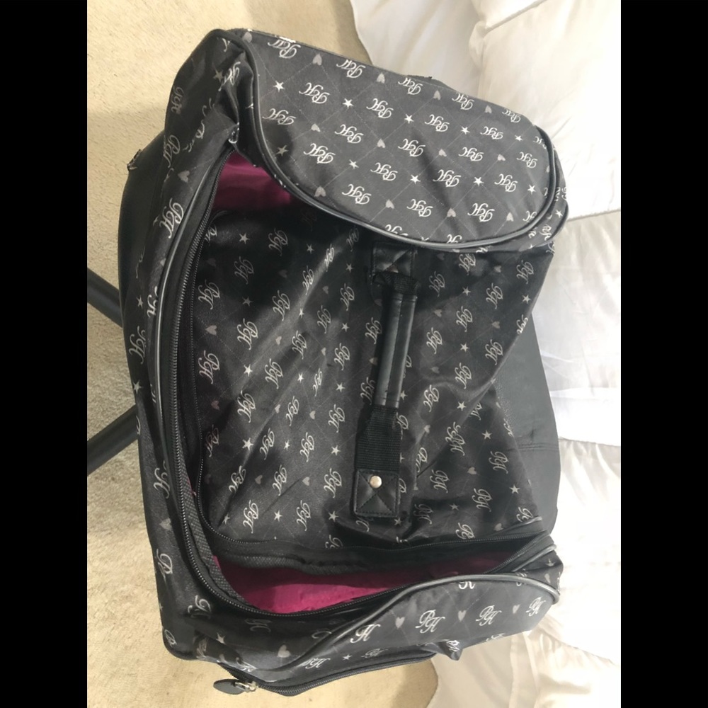 Paris Hilton traveling roller bag